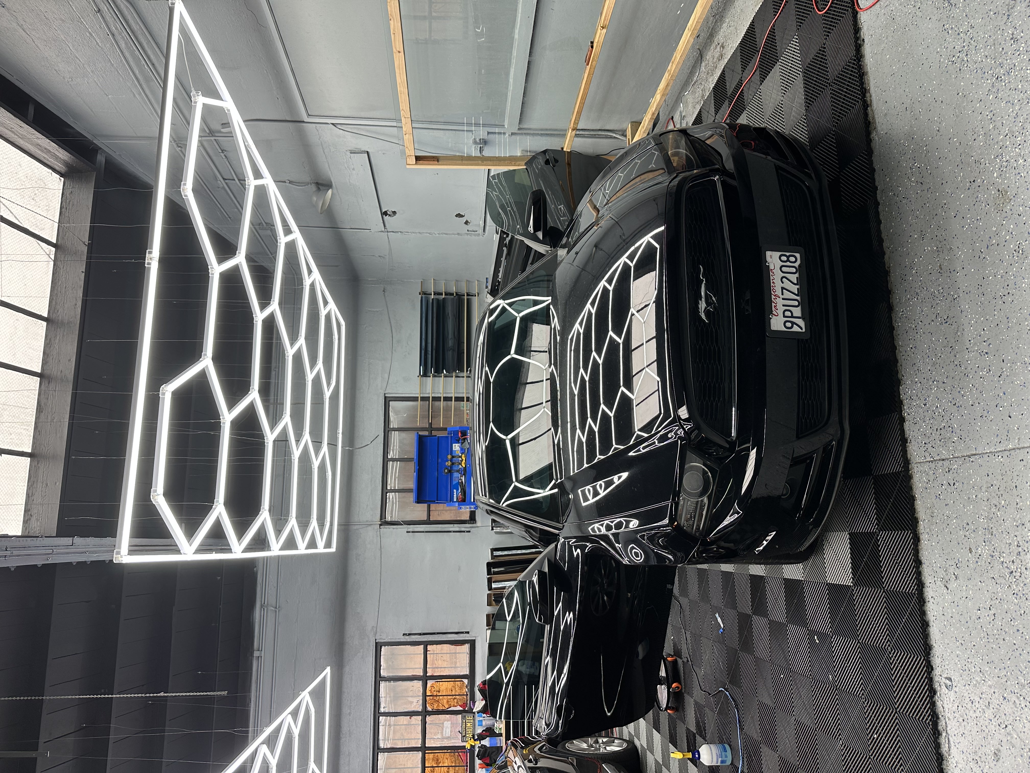 White sedan in garage bay